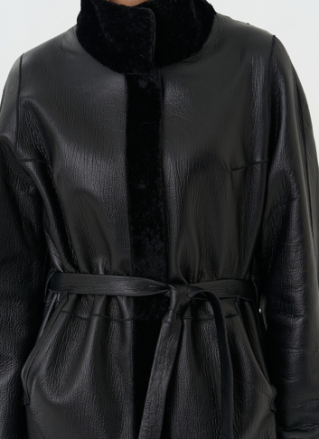 Женская двухсторонняя дубленка с поясом