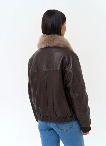 Укороченный пуховик из натуральной кожи  фото
